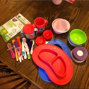 Lot of toddler feeding dishes